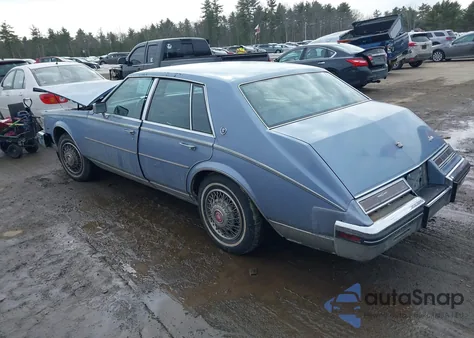 1984 Cadillac Seville z USA, uszkodzony, nr VIN 1G6AS6989EE826093
